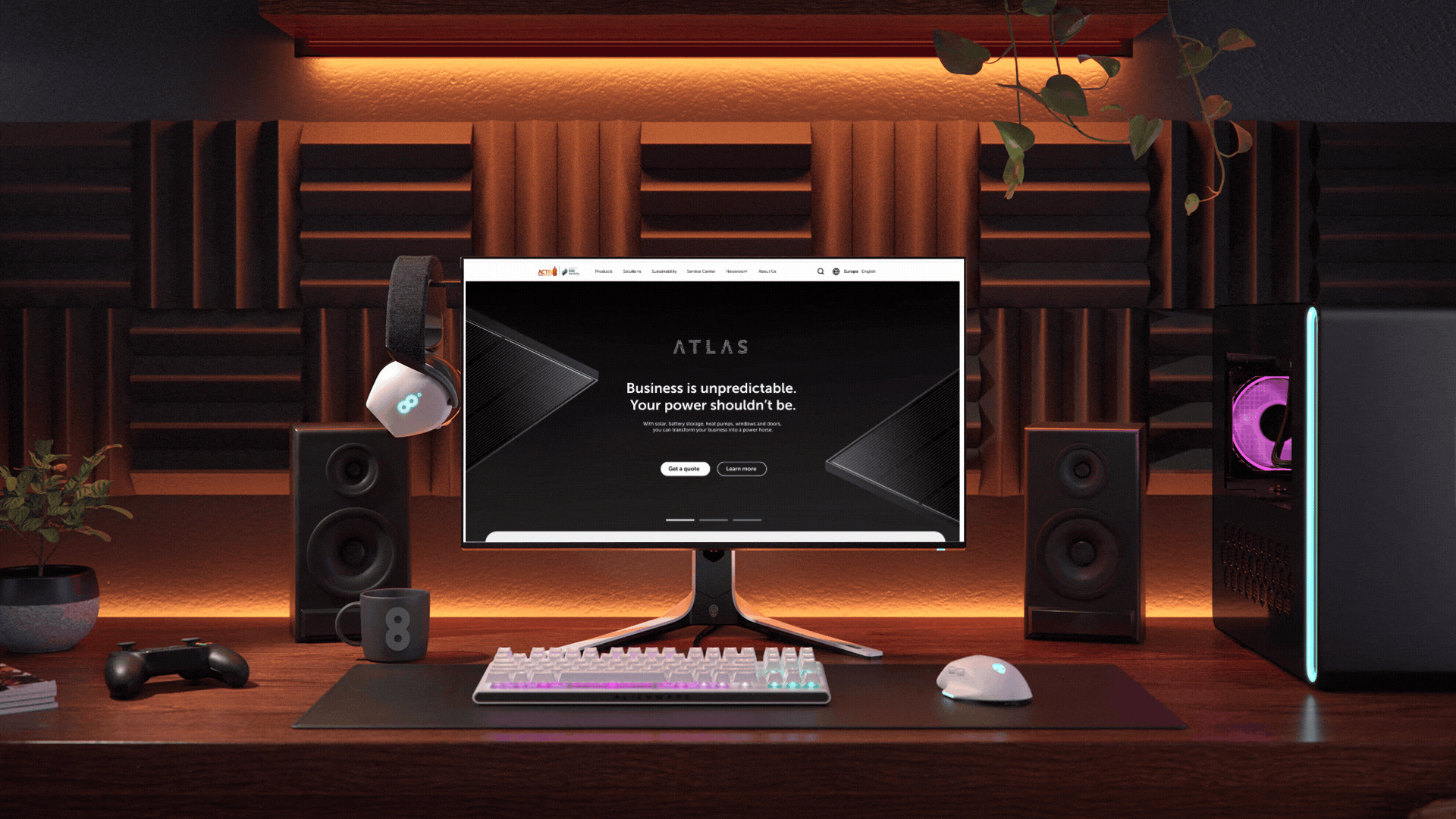 Desktop scene showing the Atlas commercial website homepage displayed on a monitor in a studio setup