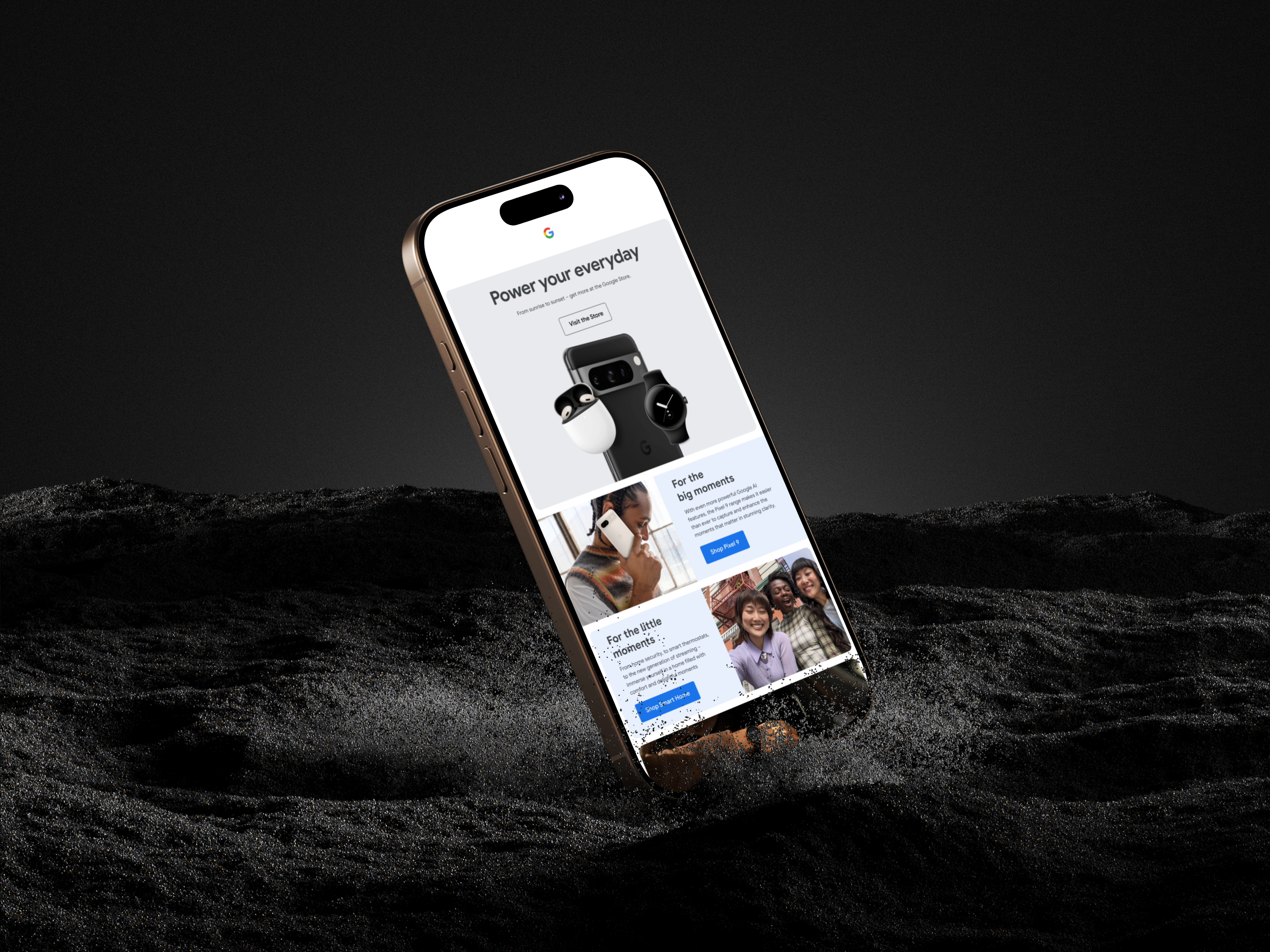 A Google Store 'Power your everyday' email shown on an iPhone half-buried in black sand